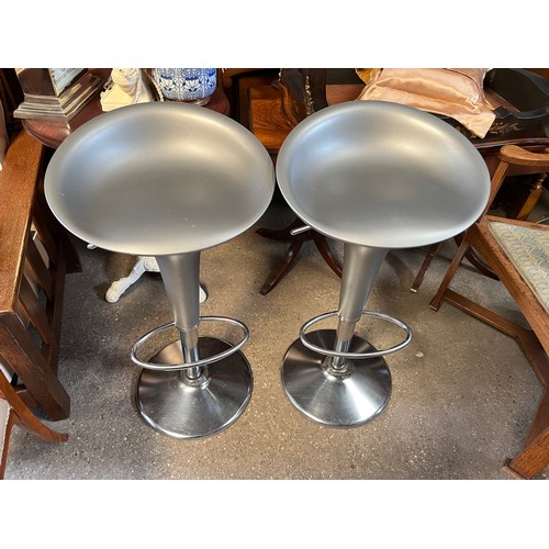 108 - Two adjustable chrome and silver bar stools, 78cm h at full height, designed by Stefano Giovannoni.