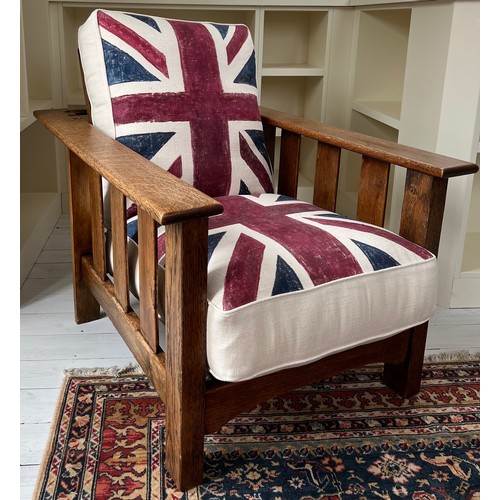 109 - Arts & Crafts reclining oak armchair with union Jack upholstered cushions. 96 h x 70 w. 55cm to top ... 