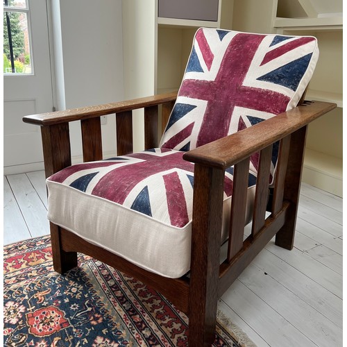 109 - Arts & Crafts reclining oak armchair with union Jack upholstered cushions. 96 h x 70 w. 55cm to top ... 