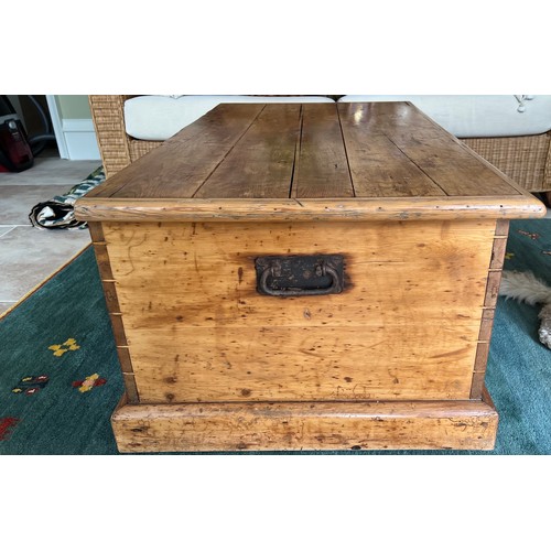 114 - Pine blanket box with metal carrying handles. 104 w x 63 d x 45cm h.