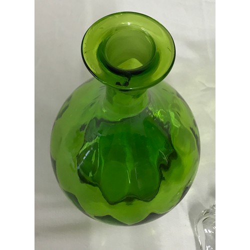 499 - Seven pieces of green glass to include a pair of decanters 17cm h, 3 small glasses 13cm h x 6.5cm d,... 