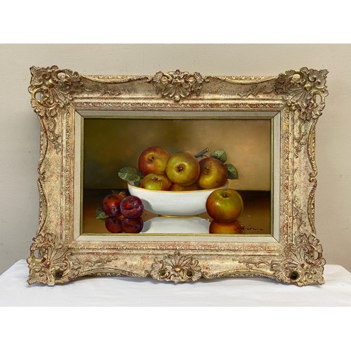 1284 - Paul Wilson (b. 1945) oil on board still life of fruit, signed L.R. 24 x 39cm.