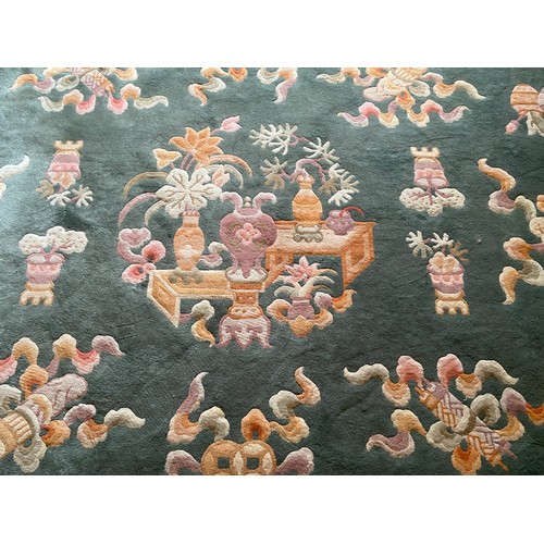 1129 - A very good quality Chinese deep pile rug Peking green. 396 x 305cm.