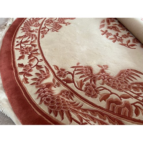 1130 - A very good quality Chinese circular wool rug. 244cm d.
