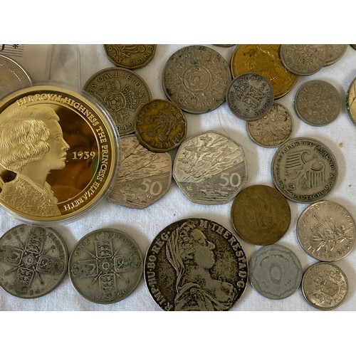 686 - A collection of various coins to include Silver 1780 Maria Theresa Thaler coin, Two Florins 1919 and... 