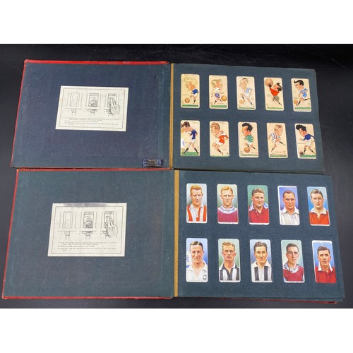 1060 - A large quantity of cigarette cards to include Wills, Player's, famous footballers Carreras, Ogden's... 