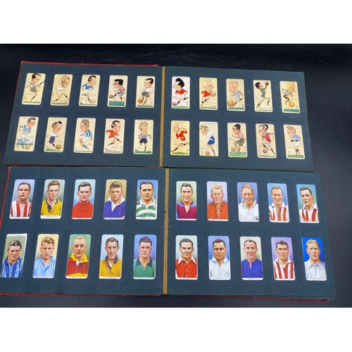 1060 - A large quantity of cigarette cards to include Wills, Player's, famous footballers Carreras, Ogden's... 