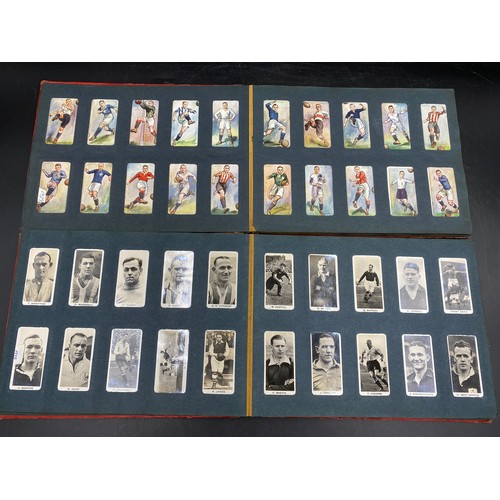 1060 - A large quantity of cigarette cards to include Wills, Player's, famous footballers Carreras, Ogden's... 