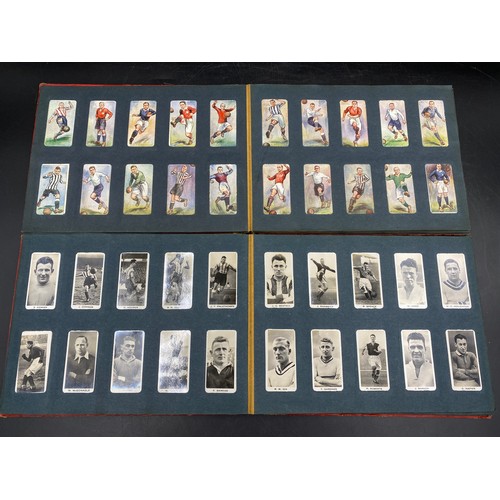 1060 - A large quantity of cigarette cards to include Wills, Player's, famous footballers Carreras, Ogden's... 