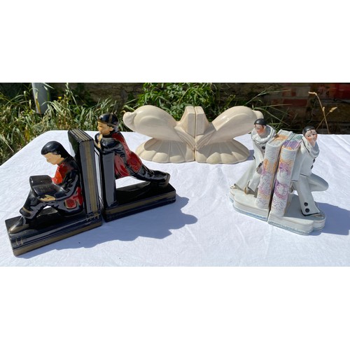 230 - Three pairs of bookends to include pair of fantail doves, pirot etc.