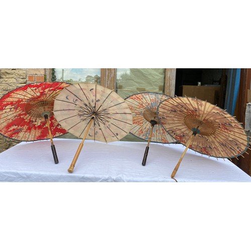 706 - Six various fabric parasols.