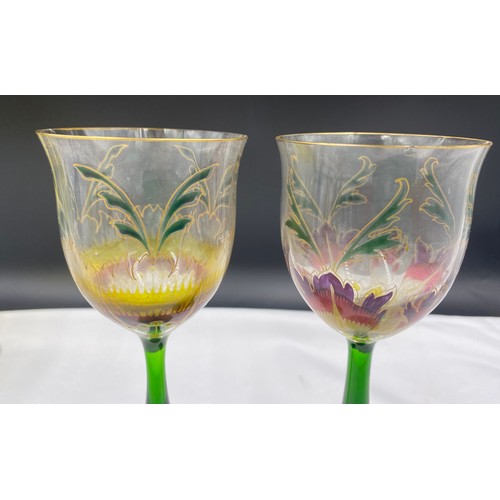 517 - Decorative part set of wine glasses depicting crocus, 4 x 20cm and 6 x 15.5cm, together with 5 other... 