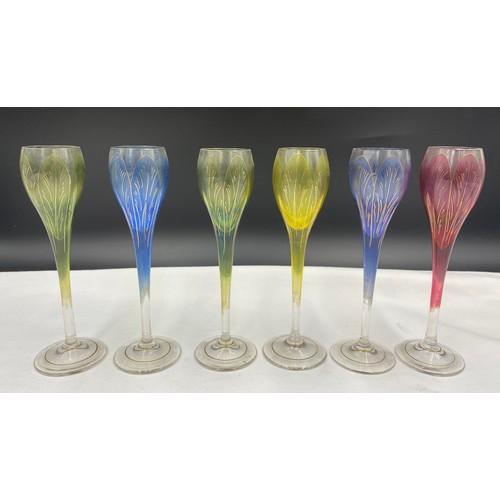 517 - Decorative part set of wine glasses depicting crocus, 4 x 20cm and 6 x 15.5cm, together with 5 other... 