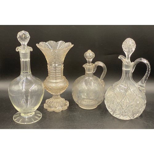 518 - A collection of six decanters various styles and sizes, tallest 32cm, together with a pair of cut gl... 