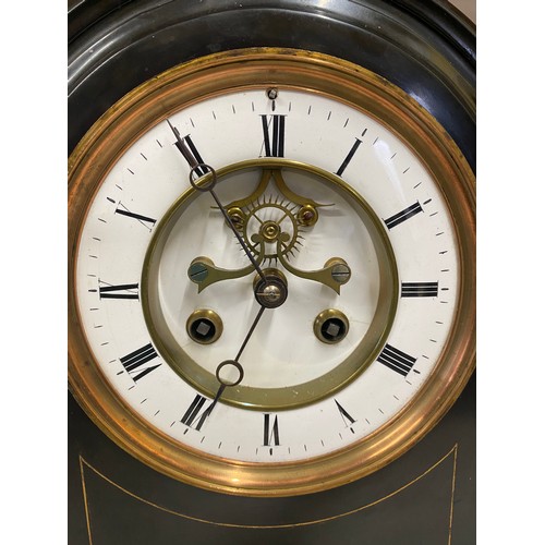 1027 - Black marble mantel clock with visible Brocot movement, enamelled dial with Roman numerals, striking... 