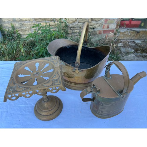 1082 - Three pieces brass to include Art Nouveau trivet 24cm h, coal helmet and lidded jug.