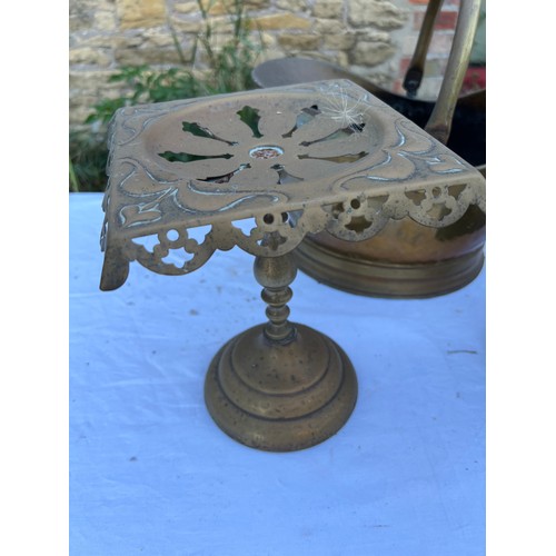 1082 - Three pieces brass to include Art Nouveau trivet 24cm h, coal helmet and lidded jug.