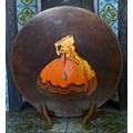 Circular wooden firescreen with crinoline lady decoration to front. 60cm d.
