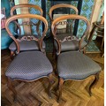 Four 19thC balloon backed dining chairs on cabriole legs with upholstered seats.
