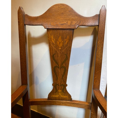 37 - Oak armchair with inlaid panel. Arm to arm 55cm, to back 105cm.