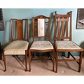 Three Arts and Crafts inlaid single chairs, two mahogany, the other oak.