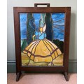 An oak firescreen with stained glass panel. 76 h x 55cm w.