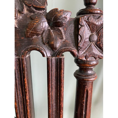 49 - Two late 19thC carved oak side chairs. Ht 115cm.