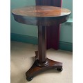 A Regency rosewood circular occasional table. 75 h x 55cm d.