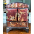 Late 19thC lacquer cabinet painted with birds and bulrushes, two doors (concealing 6 drawers) and 3 ... 