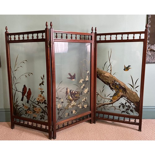 63 - An Edwardian walnut screen with glass panels painted with birds amongst foliage. Approx. 108 h x 154... 