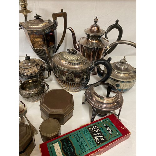 781 - A large quantity of silver plate to include coffee and tea pots, candelabra, etc.