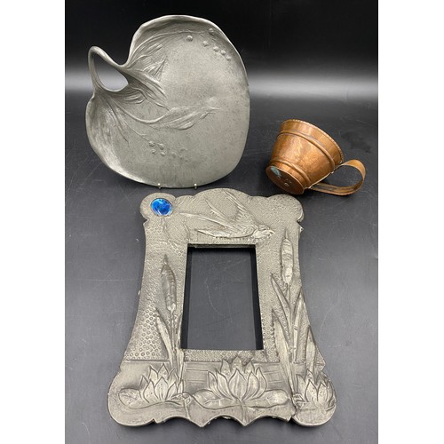 945 - Pewter picture frame set with a blue cabochon to top left,  depicting a bird flying over bulrushes a... 