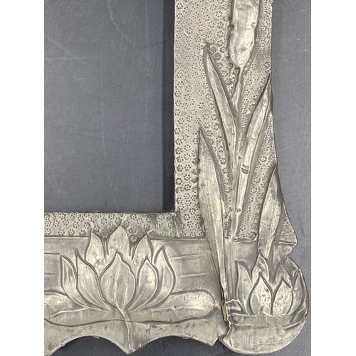 945 - Pewter picture frame set with a blue cabochon to top left,  depicting a bird flying over bulrushes a... 