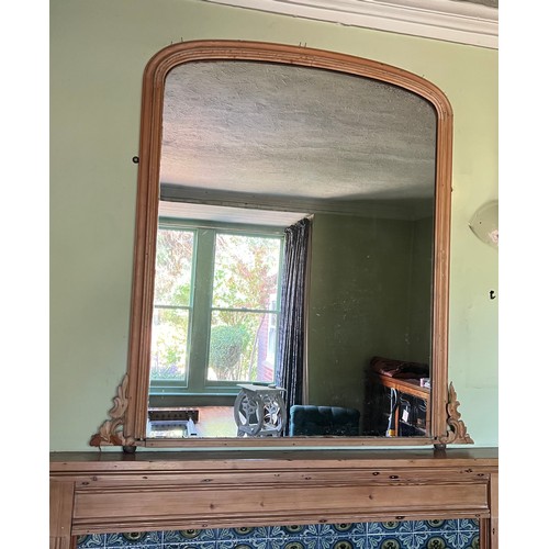 1144 - Pine framed over mantle mirror. Approx 122 h x 116cm w.