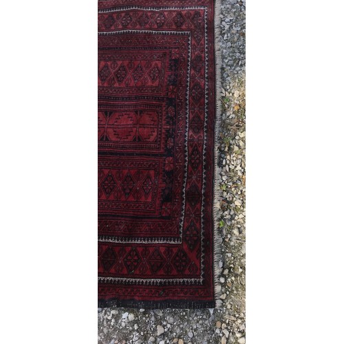 1131 - Oriental runner, predominantly red. 300 l x 80 w.