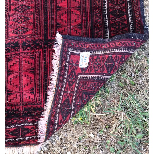 1131 - Oriental runner, predominantly red. 300 l x 80 w.