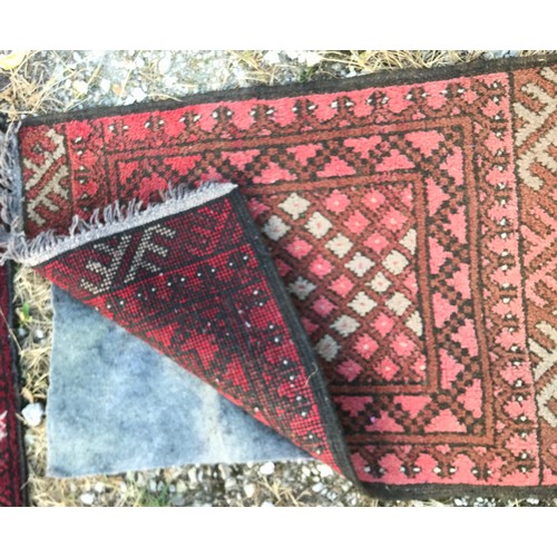 1135 - Three rugs, largest 103 l x 84cm w, second largest 72 l x 52 w and smallest 60 l x 39cm w.