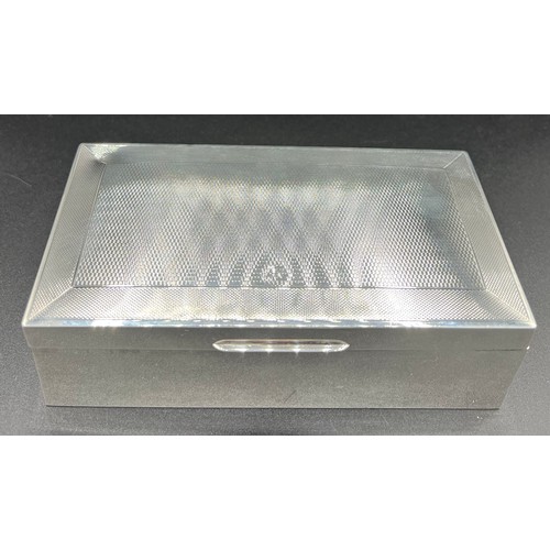 833 - Silver cigarette box Birmingham 1956 maker Walker & Hall. 17 x 9cm.