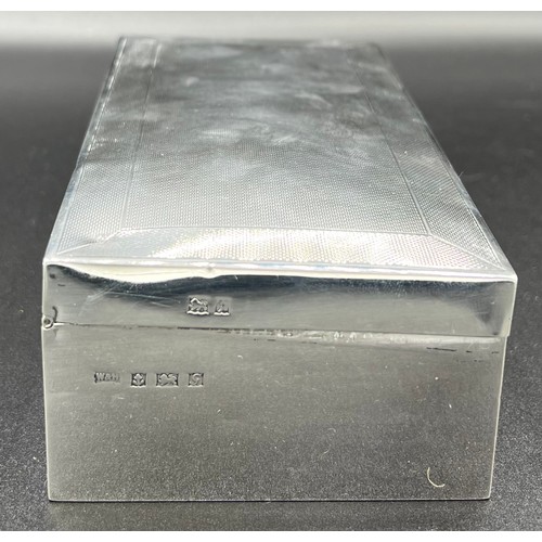 833 - Silver cigarette box Birmingham 1956 maker Walker & Hall. 17 x 9cm.