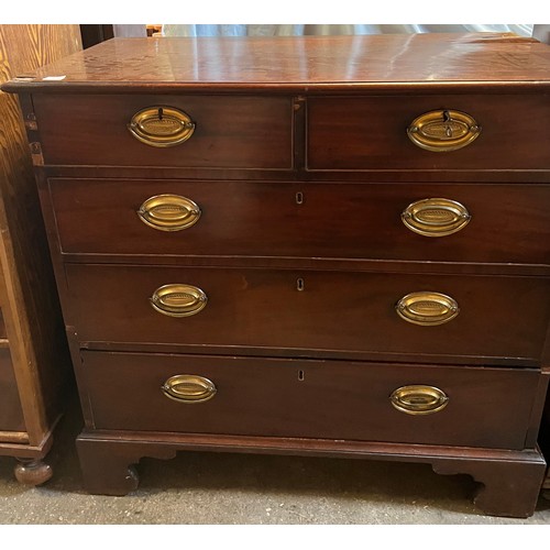 68 - A 19thC mahogany chest of 2 short over 3 long drawers on bracket feet. Original brass handles. 95 w ... 