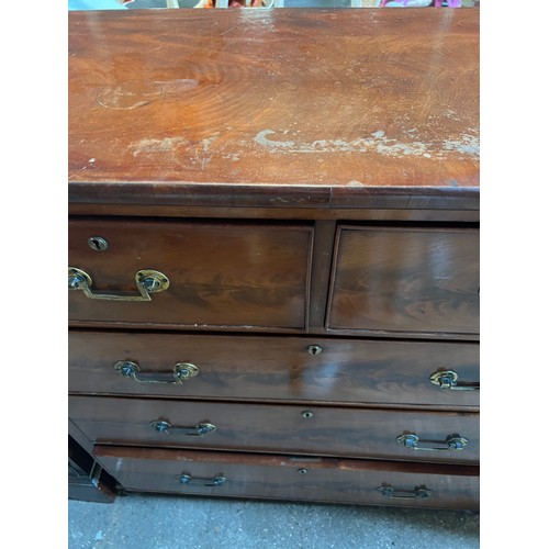 71 - A 19thC mahogany chest of 2 over 3 drawers on bun feet with brass drop handles.