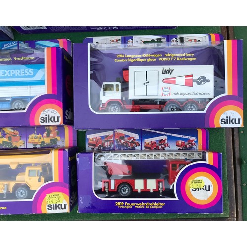 988 - Twelve boxed diecast Siku trucks, crane and mobile home to include Nos. 2914 Kranwagon Mobile Crane,... 