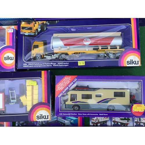 988 - Twelve boxed diecast Siku trucks, crane and mobile home to include Nos. 2914 Kranwagon Mobile Crane,... 