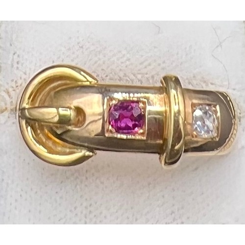 560 - A 15ct yellow gold buckle ring set with ruby and diamond, size T, weight 11.3gm.