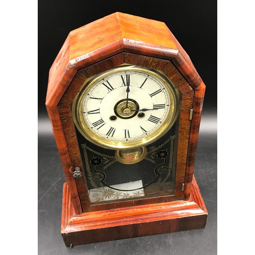 1022 - Mahogany mantle clock 36 h x 25.5 w x 11.5cm d. Made my New Haven Clock Co, New Haven, Connecticut, ... 