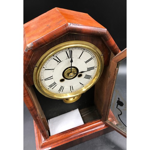 1022 - Mahogany mantle clock 36 h x 25.5 w x 11.5cm d. Made my New Haven Clock Co, New Haven, Connecticut, ... 