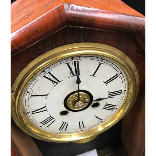 1022 - Mahogany mantle clock 36 h x 25.5 w x 11.5cm d. Made my New Haven Clock Co, New Haven, Connecticut, ... 