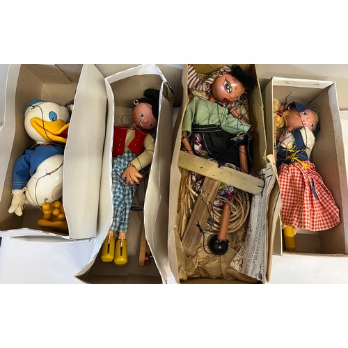 993 - Four various puppets to include Pelham in original box.