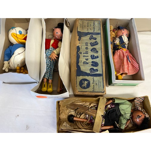 993 - Four various puppets to include Pelham in original box.