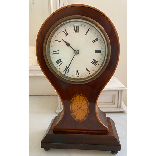 1017 - French mahogany inlaid mantle clock with bun feet and enamel dial with Roman numerals. 23cm h.